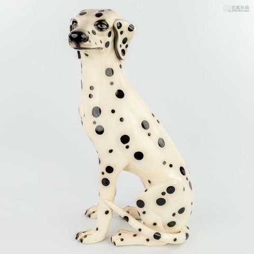 A mid-century statue of a Dalmatian made of glazed faience i...