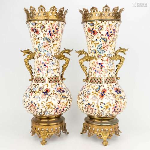 A pair of bronze mounted faience vases marked J. Fischer Bud...