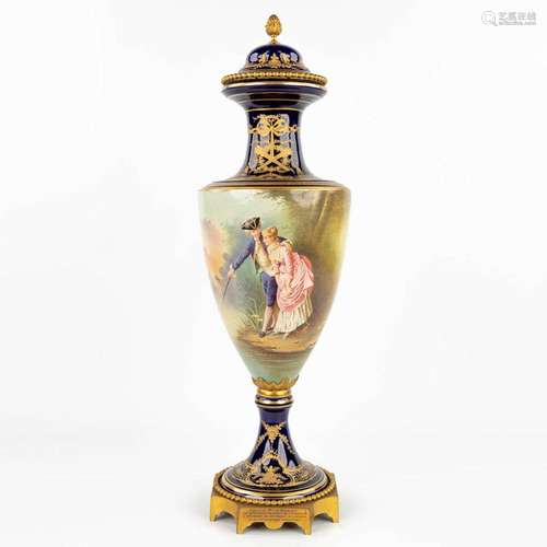 A vase with a hand-painted romantic decor, made by Sèvres an...