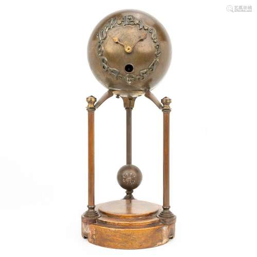 An antique table clock with a ball made in art nouveau style...