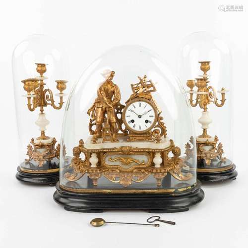 A three-piece mantle clock made of gilt spelter and alabaste...