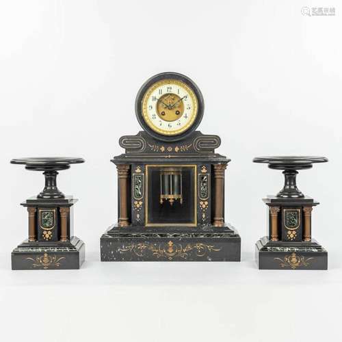 A three-piece garniture clock made of marble mounted with gi...