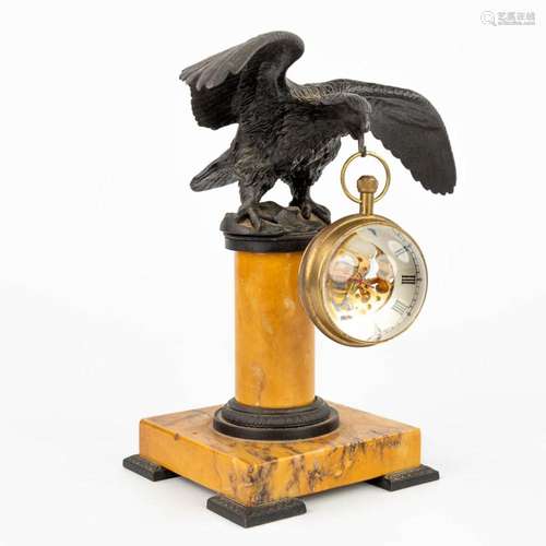 A pocket watch holder in the shape of an eagle mounted on a ...