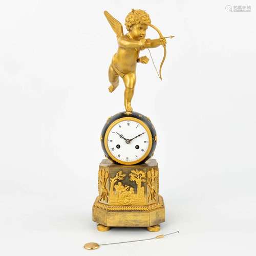 An exceptional mantle clock 'Cupido' made of gilt an...