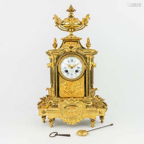 A mantle clock made of gilt bronze and marked Luppens. (H:48...