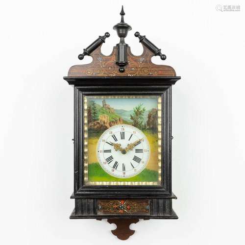 A black forest wall clock. (H:52cm)