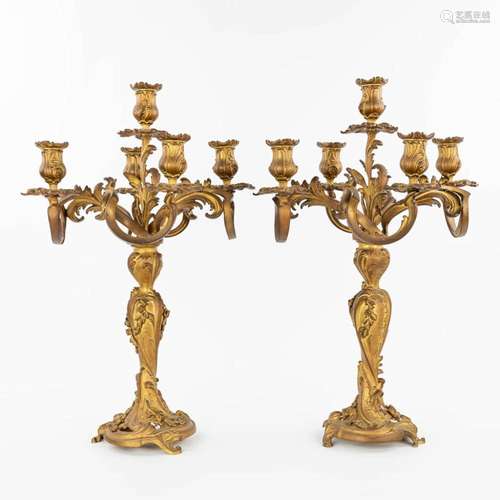 A pair of candelabra made of gilt bronze in Rococo style. (H...