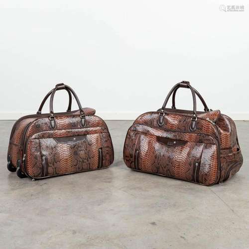 A set of 2 travel bags made of leather by Montblanc. (H:34cm...