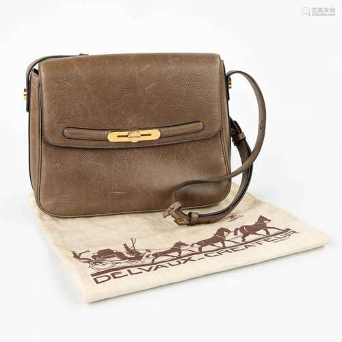 A handbag made of brown leather and marked Delvaux. (H:22cm)