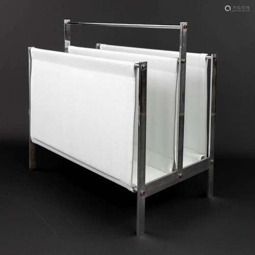 A 'Porte Revues' Magazine rack made of chrome-plated...