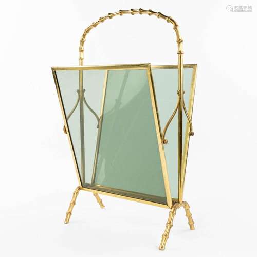 A faux bamboo newspaper holder, brass and glass, in the styl...