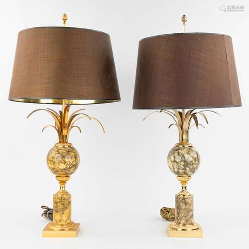 A pair of table lamps in Hollywood Regency style, with balls...