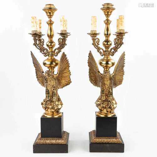 A pair of table lamps in the shape of an eagle made of gilt ...