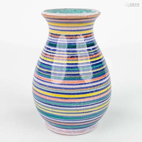 A vase made of glazed ceramics with geometric shapes for Per...