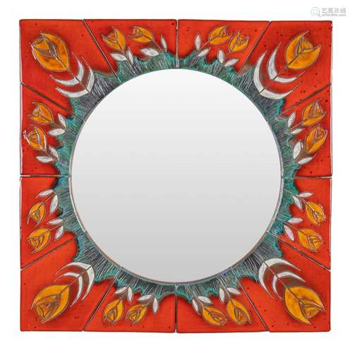 A mid-century mirror decorated with tiles made by Oswald TIE...