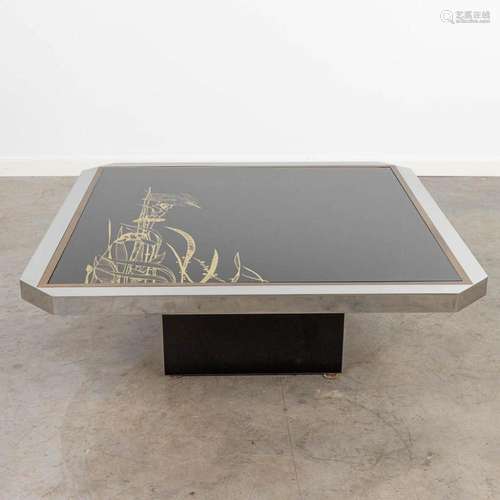 A coffee table made of glass and metal finished with a King ...