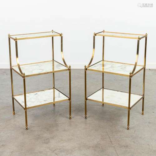 A pair of three tiers side tables made of brass and glass by...