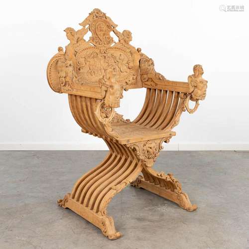 An antique 'Dagobert Chair' made of stripped sculptu...