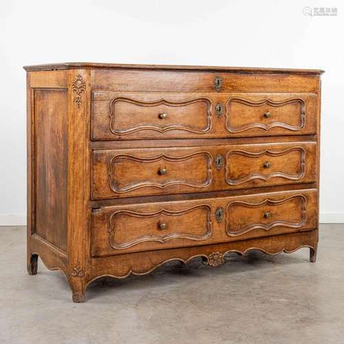 An antique commode with 3 drawers and a secretaire top, made...