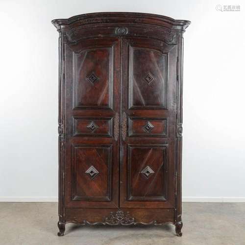 An antique wardrobe made of oak, early 18th century. (H:254c...