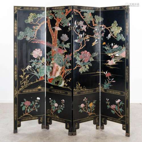 A vintage room divider made in Chinese style and inlaid with...