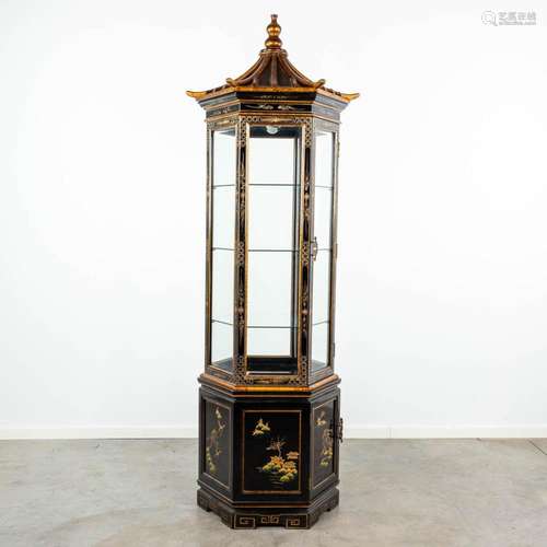 A black lacquered Chinese style hexagonal Pagoda display cab...