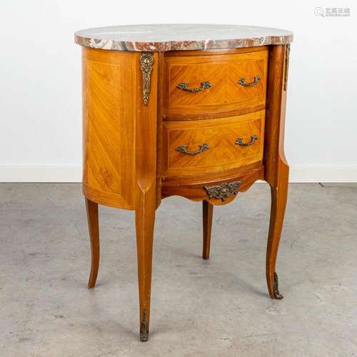 A side table with a marble top and mounted with bronze in Lo...