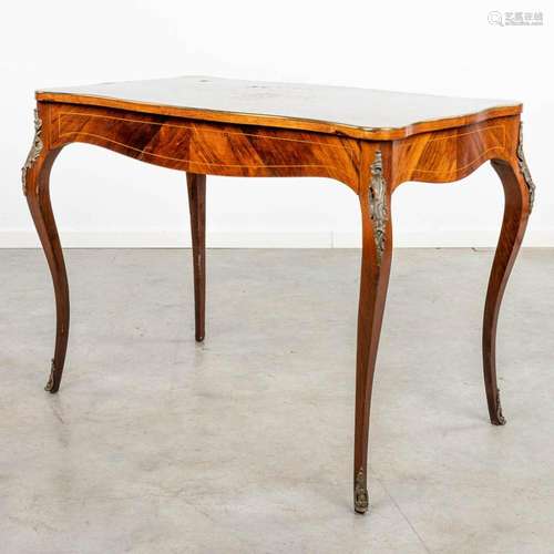 A side table decorated with marquetry inlay in Louis XV styl...