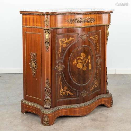 A one door cabinet decorated with marquetry inlay and mounte...