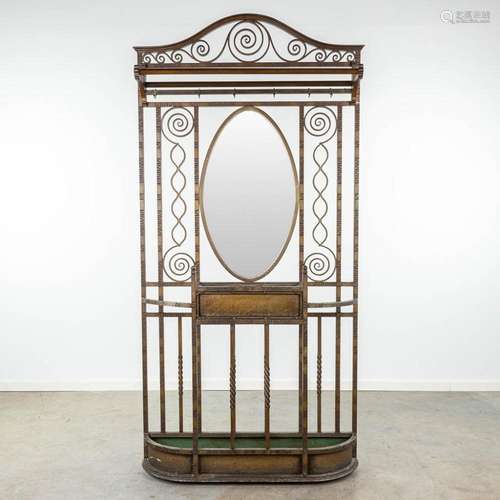 A coathanger and umbrella stand with mirror made of wrought ...