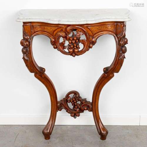 Een small console table with white marble top, made of sculp...