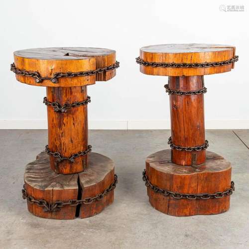 A pair of decorative side tables made of wood mounted with c...