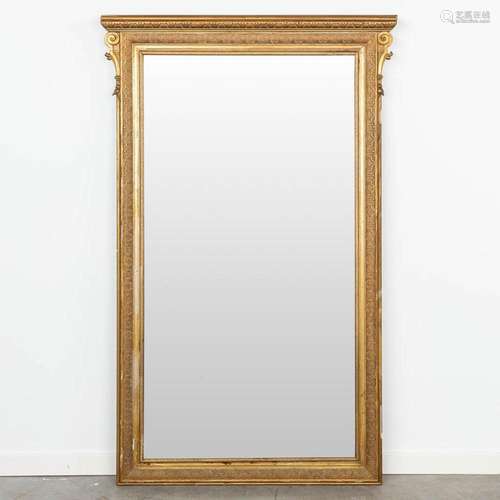 A mirror made of wood and finished with gilt stucco. (H:148c...