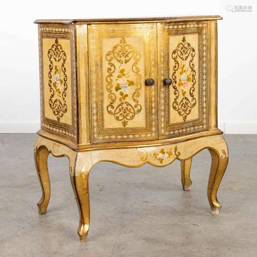 A two-door side cabinet made of gilt wood. (H:73cm)