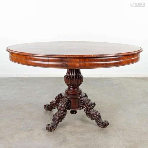 An antique extendable table made in Louis Philippe style. 19...