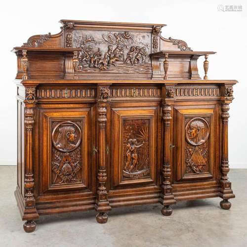 An exceptional sideboard with fine sculptured panels in symb...