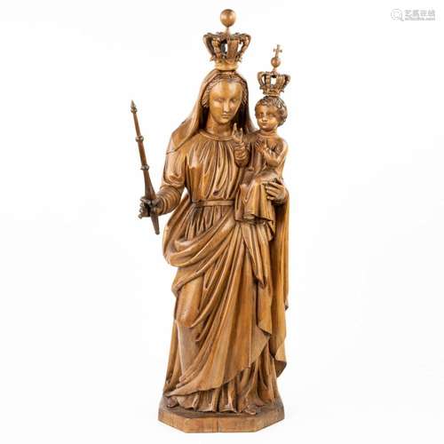 An antique wood sculptured crowned Madonna with crowned chil...