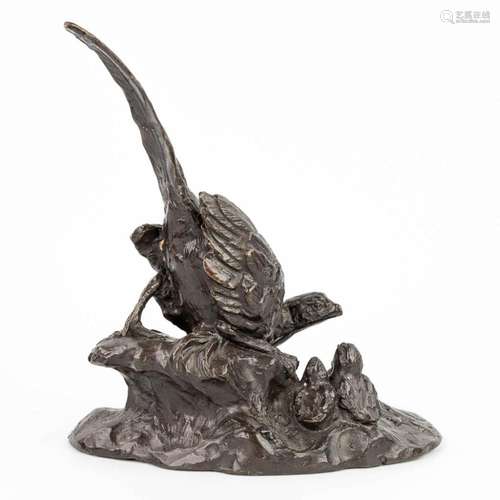 A bronze figurine of a pheasant with youngs, made of bronze....