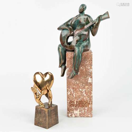 A collection of 2 modern artworks made of bronze. Christia P...