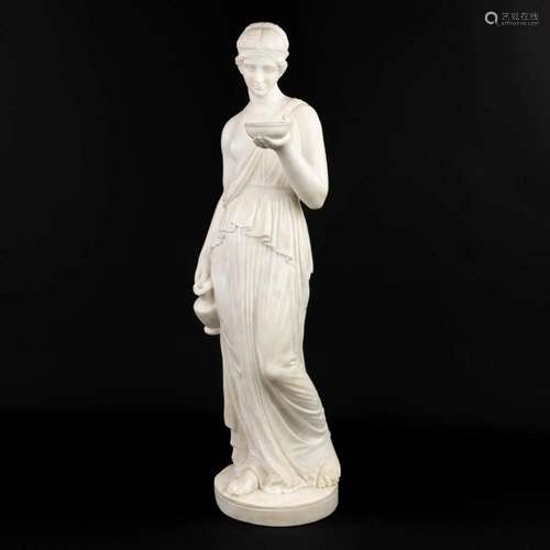 A classical statue of a Greek lady with a jug and bowl, made...