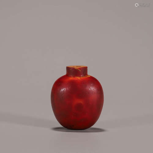 A red glass snuff bottle