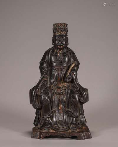 A gilt copper buddha statue