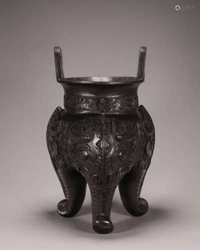 A taotie patterned bronze double-eared pot