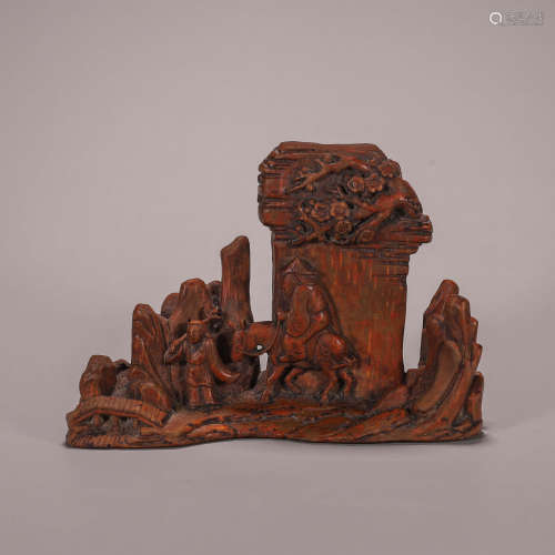 A figure carved bamboo brush stand