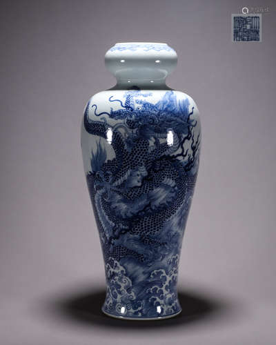 A blue and white cloud and dragon porcelain vase