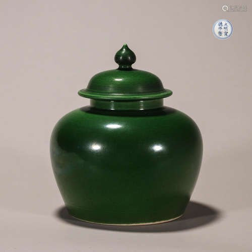 A green glazed porcelain covered jar