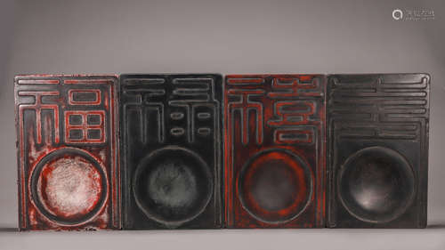 A set of 4 inscribed inkstones