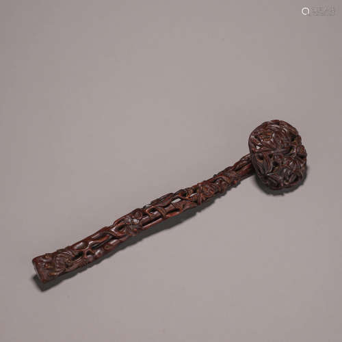 A rosewood carved ruyi ornament