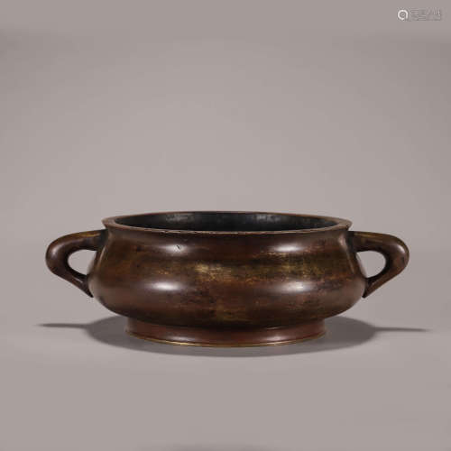 A copper censer with dragon-shaped ears