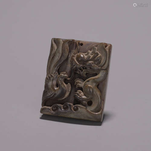 A dragon and phoenix agate plaque